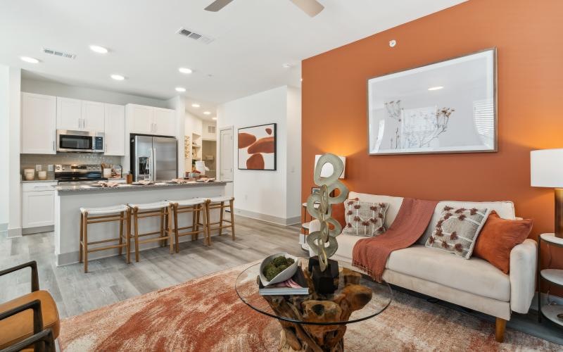 a living room with a couch and a table